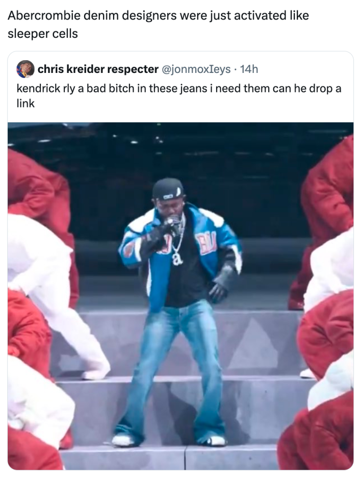 Super bowl half time show meme, text reads, "Abercrombie denim designers were just activated like sleeper cells" with a photo of Lamar singing at the Super Bowl.