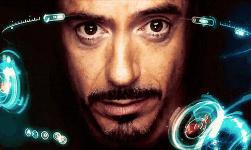 tony stark smirk jarvis gif