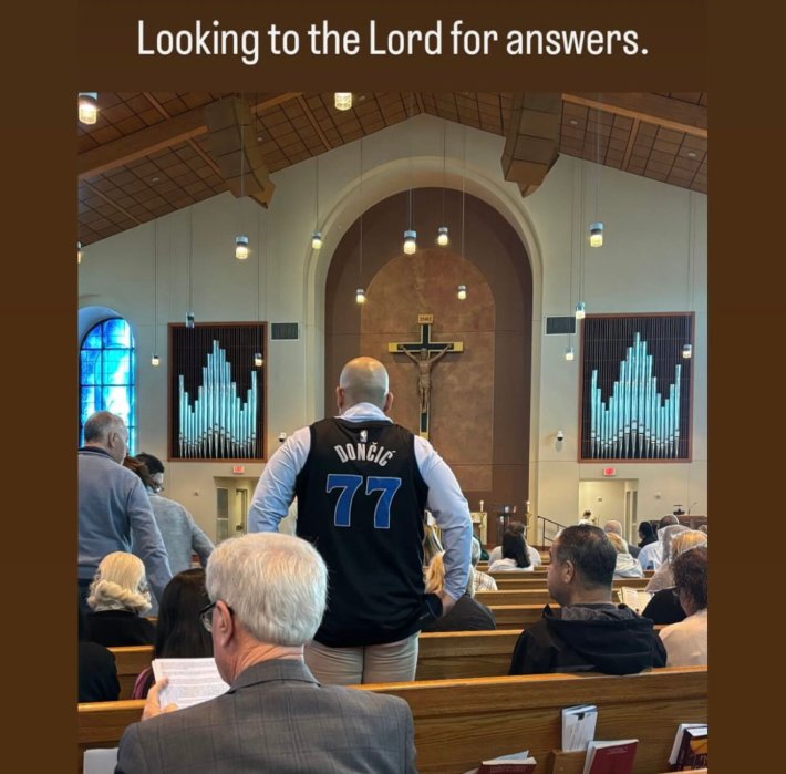 Luka Doncic meme, text reads, "Looking to the Lord for answers." with a photo of an older man in a Doncic jersey standing in the pews of a church.