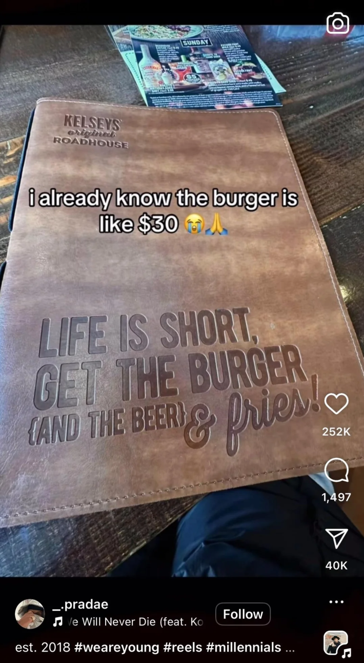 Instagram video showing a menu with a leather-style cover.