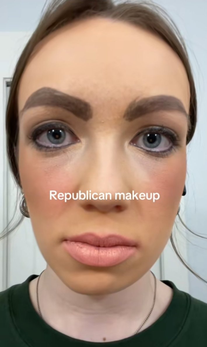 Woman with a face of badly done makeup in a TikTok video.