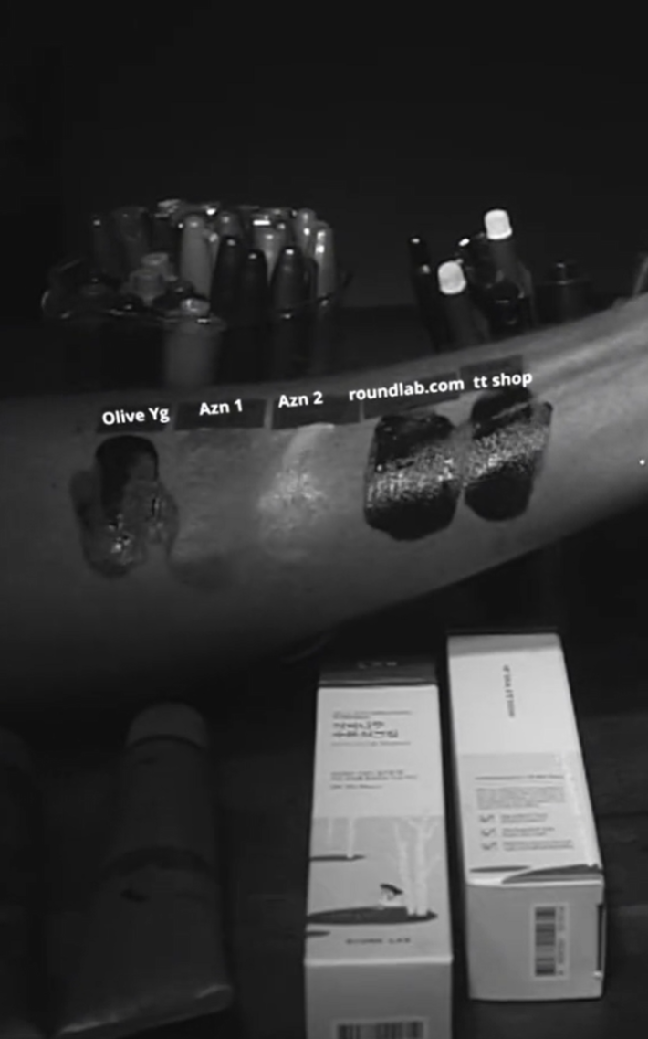 TikTok video showing a real UV sunscreen product compared to an Amazon fake under a UV light.