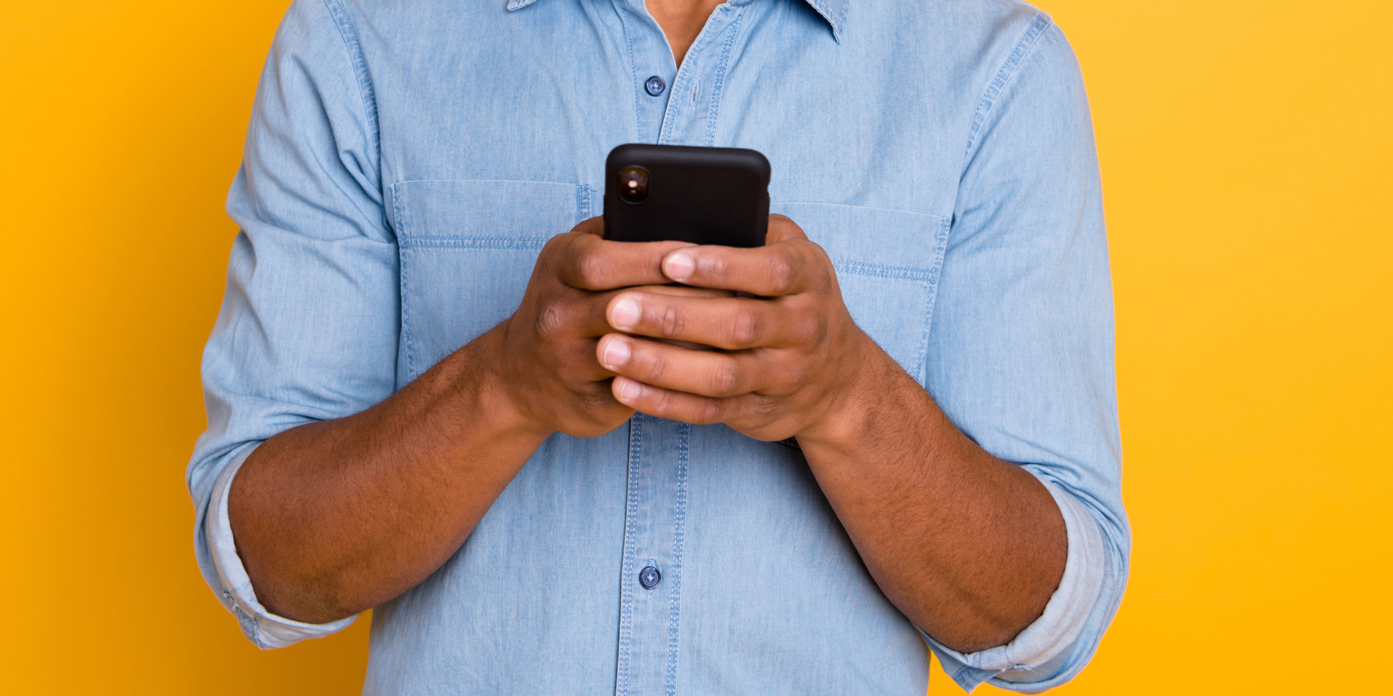 A person texting on their phone.