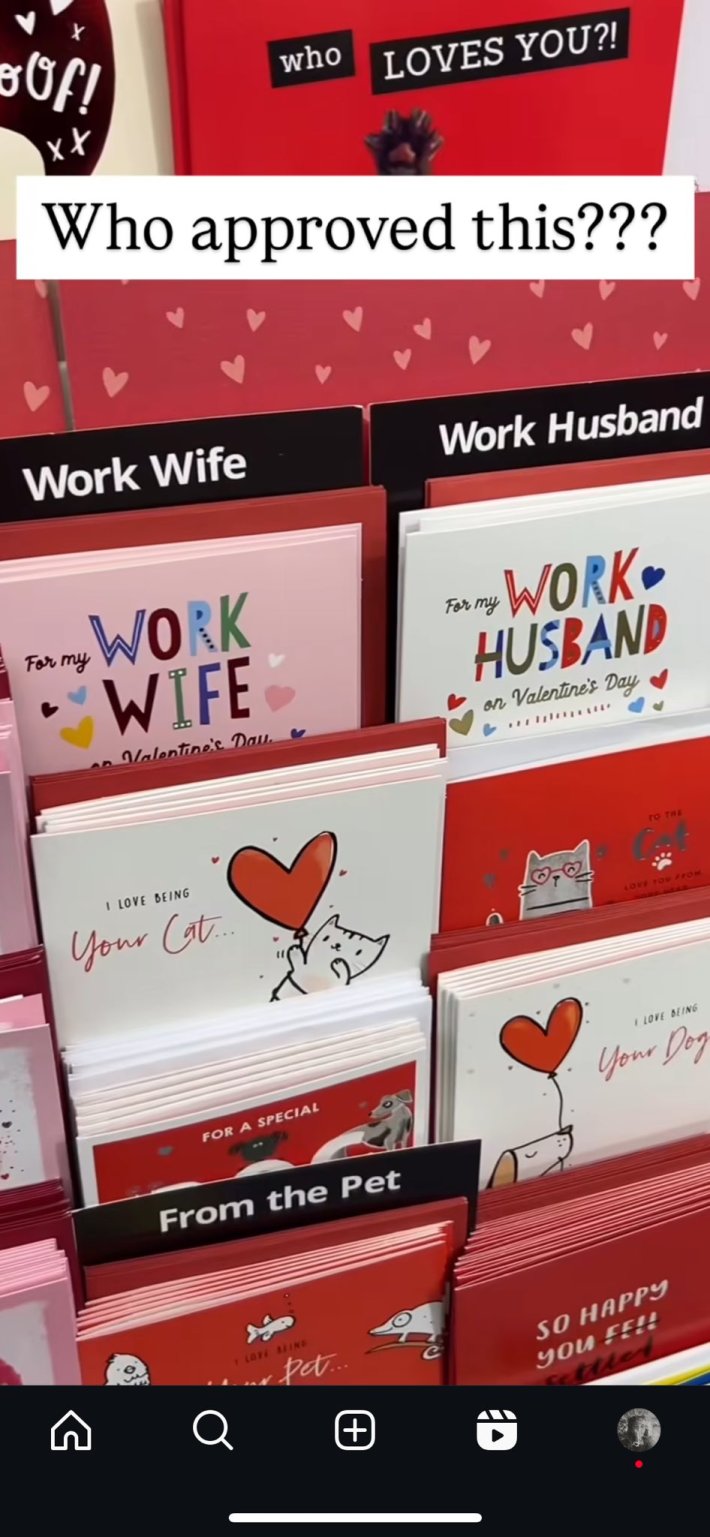Photo of Valentine's Day cards including ones labeled "work wife" and "work husband" with a caption reading "Who approved this???"
