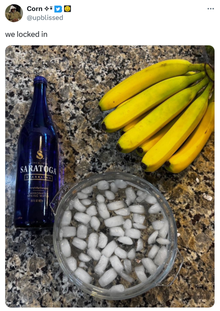 Saratoga water meme, text reads, "we locked in" with a photo of Saratoga water bottle, ice bath, and a bunch of bananas on a counter top.