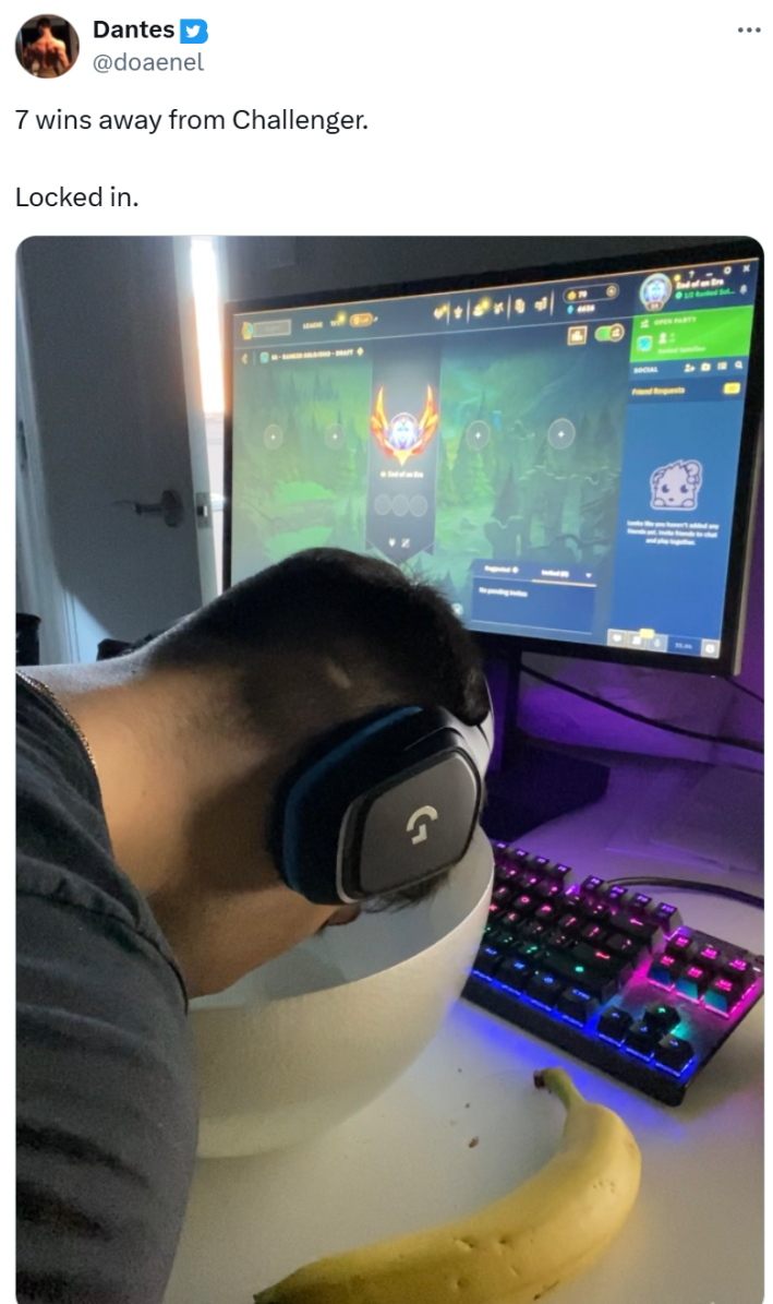 Saratoga water meme, text reads, "7 wins away from Challenger. Locked in." with a photo of a man in headphones with his face in a bowl of ice water, a banana on the desk beside him. The computer is showing the game he's currently playing.