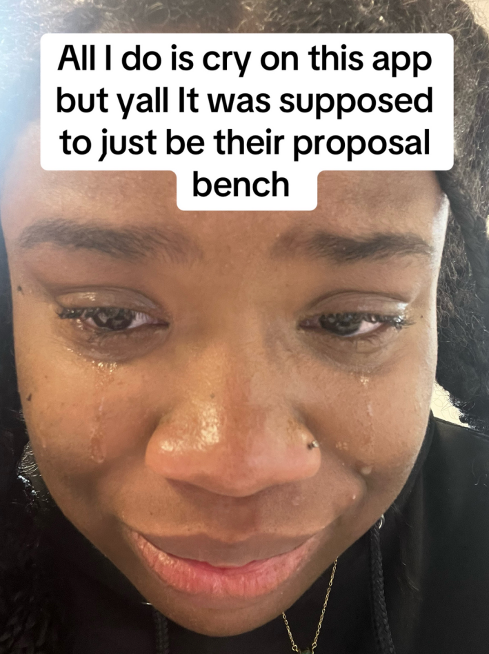 A woman crying with the caption "But y'all i was supposed to just be their proposal on a bench."