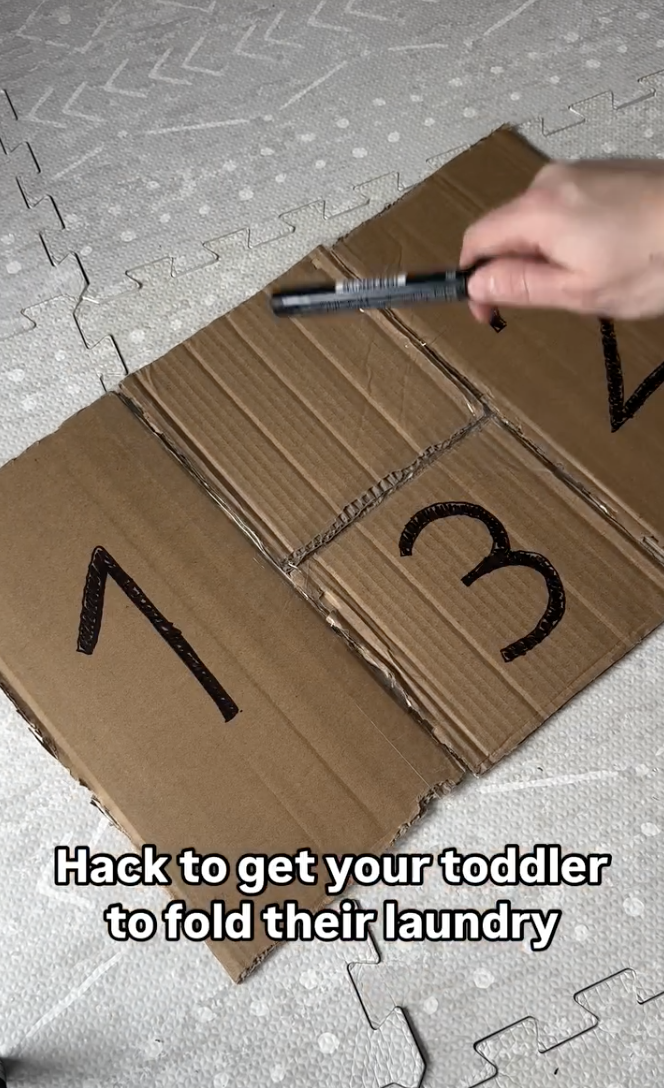 An instagram reel showing a cardboard mechanism to help your children fold laundry