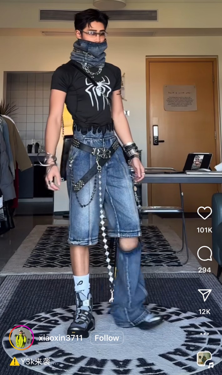 Grungy Y3K outfit with denim bandana, distressed jean shorts, and crossed grommet belt