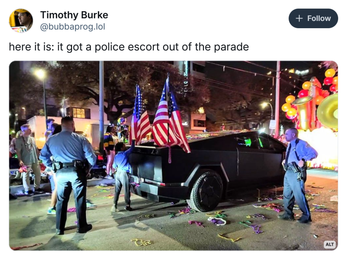 Post about the Cybertrucks at Mardi Gras incident, text reads, "here it is: it got a police escort out of the parade" with a photo of a Cybertruck getting pulled from the parade.