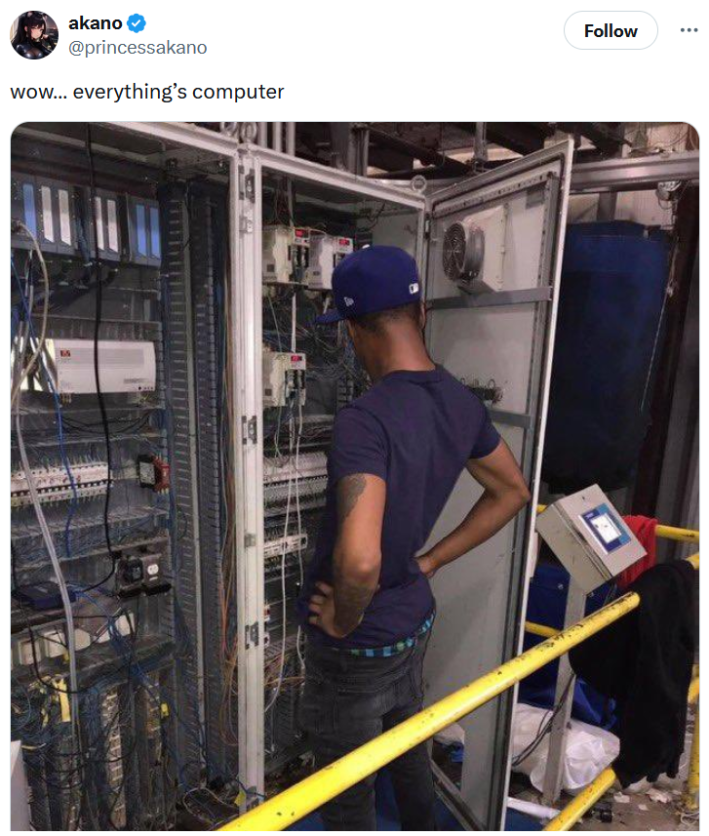 Everything's computer meme with a photo of a man looking into a server with hands on his hips.