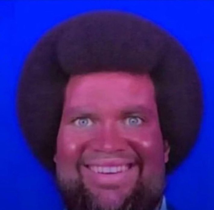 The US Vice President Photoshopped with a wide-eyed smile and an Afro.