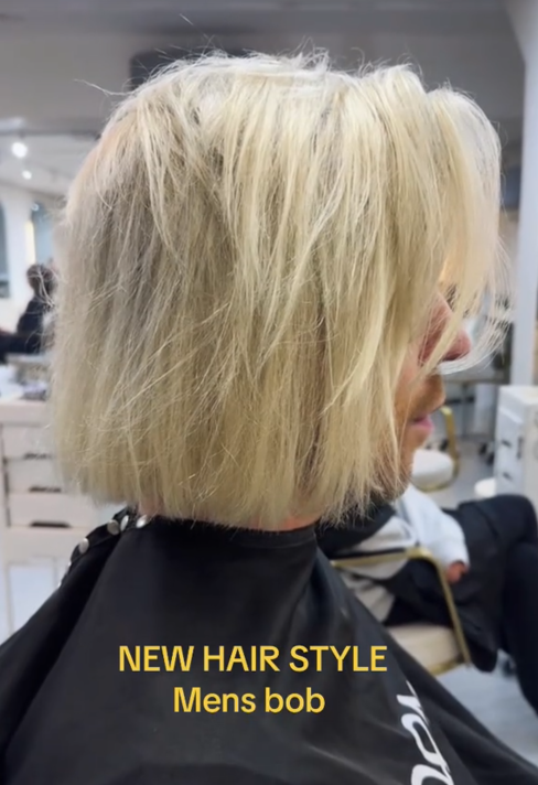 TikTok video with a side view of a blonde men's bob hair style.