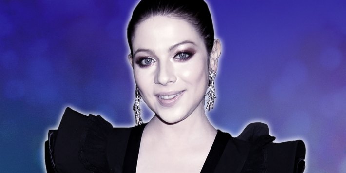 Photo of the actress Michelle Trachtenburg on a Purple background.