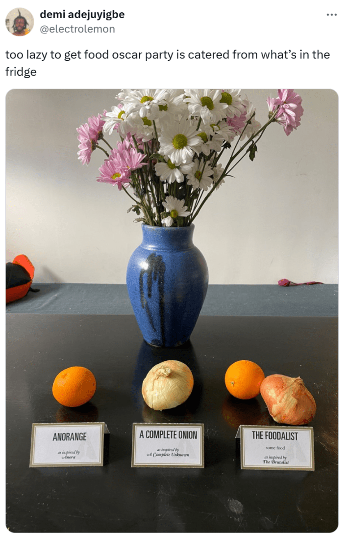 Oscars meme, text reads, "too lazy to get food oscar party is catered from what’s in the fridge" with a photo of three groupings of food in front of a vase of flowers.