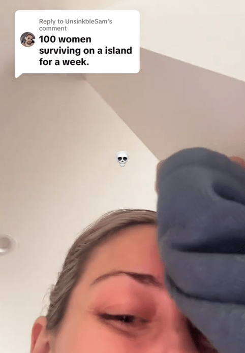 A women laughing in a TikTok video under a comment reading "100 women surviving on a island for a week,"