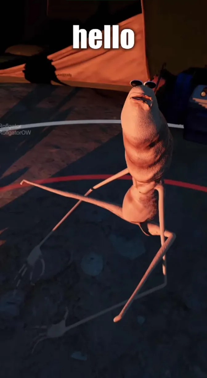 Screenshot of Marcus the worm sitting at a campfire in the dark, his eyes blown wide as he says, "hello"