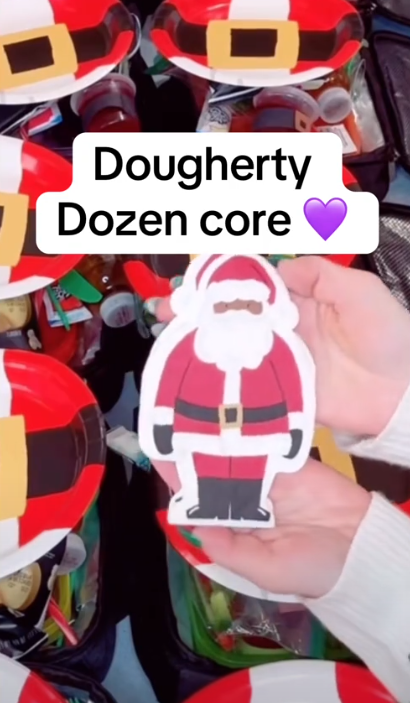 Black Santa Napkin meme TikTok video with a caption reading "Dougherty Dozen core."