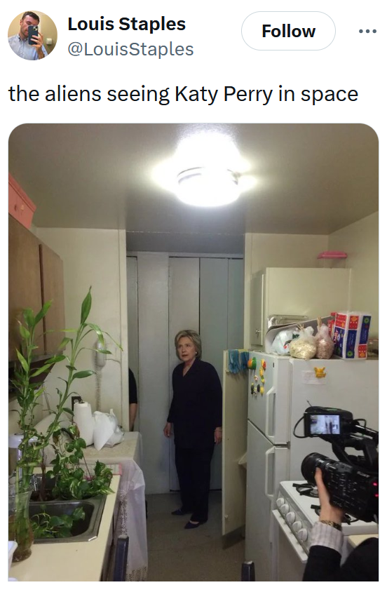 Blue Origin meme with the photo of Hillary Clinton in an apartment about aliens seeing Katy Perry in space.