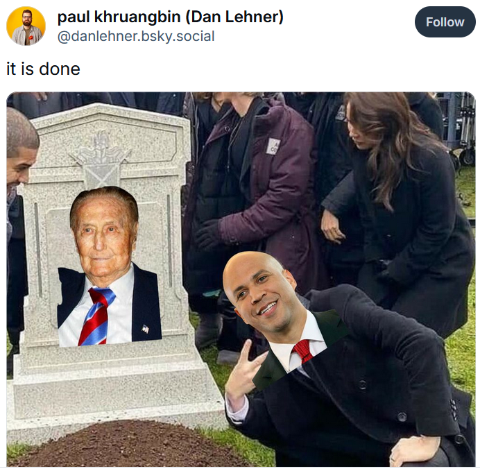 Cory Booker meme using the photo of the man making a peace sign by a grave.