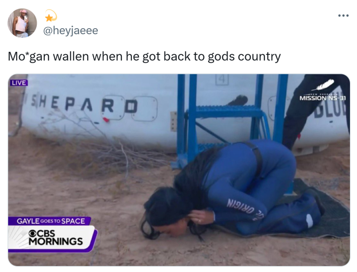 Tweet that reads, "Mo*gan wallen when he got back to gods country" with a photo of Katy Perry kissing the ground upon landing.