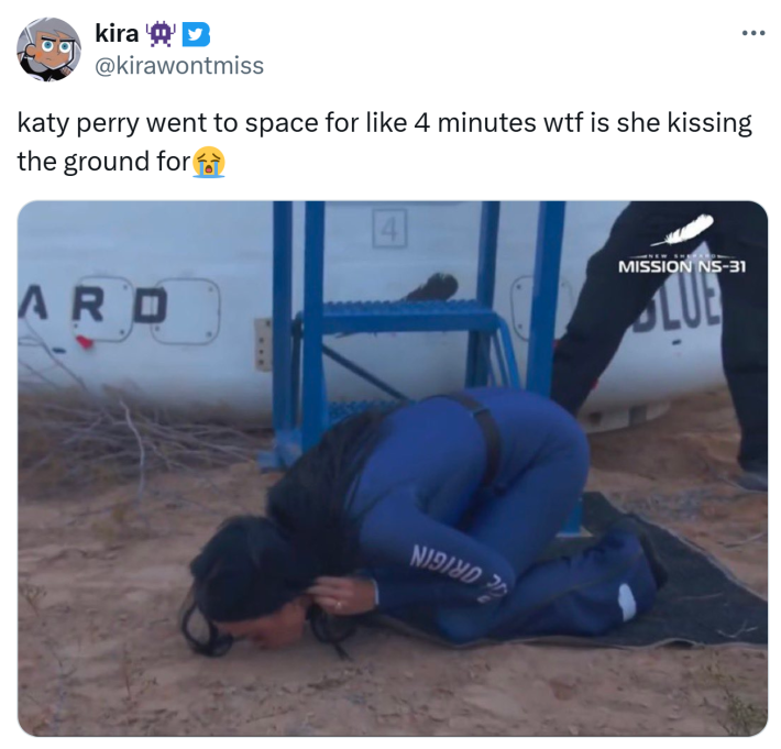 Tweet that reads, "katy perry went to space for like 4 minutes wtf is she kissing the ground for (sob emoji)"