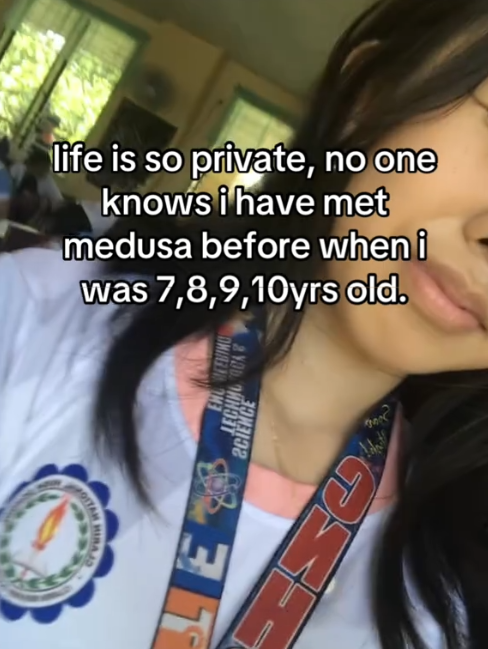TikTok video of a woman with a caption reading "life is so private, no one knows i met medusa before when i was 7, 8, 9, 10 yrs old."