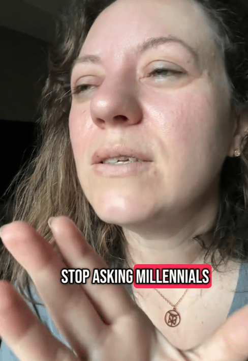 A woman speaking with her hand up saying "stop asking millennials."