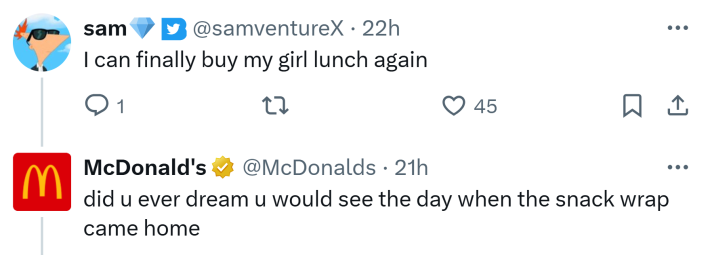Tweet about the return of the Snack Wrap. Text reads, "I can finally buy my girl lunch again" to which the official McDonald's account responded, "did u ever dream u would see the day when the snack wrap came home"