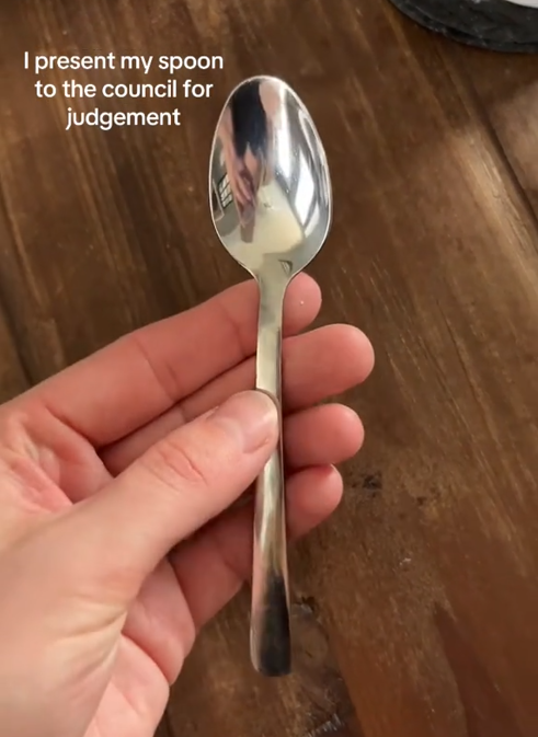 Spoontok spoon rating video showing a silver spoon with an even handle and standard head.