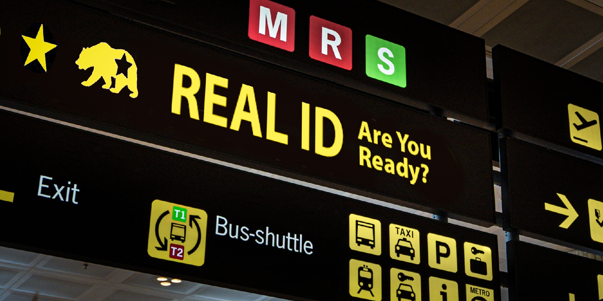 photo showing a sign in a public place that reads, "REAL ID Are you ready?"