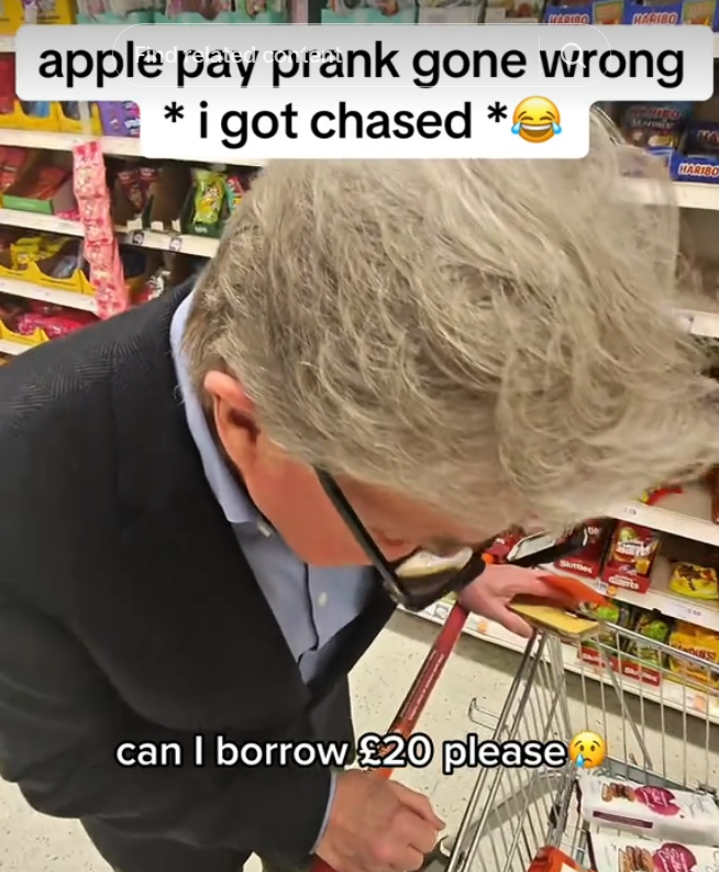 Apple Pay prank video of an older man in glasses getting asked for ₤20.