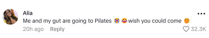 TikTok comment, text reads, "Me and my gut are going to Pilates (cry and laughing emojis) wish you could come (giggle emoji)"