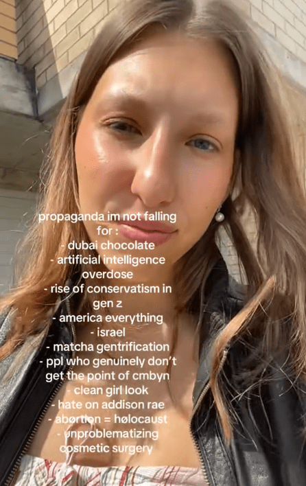 Propaganda I'm not falling for TikTok video with a woman in a black jacket.