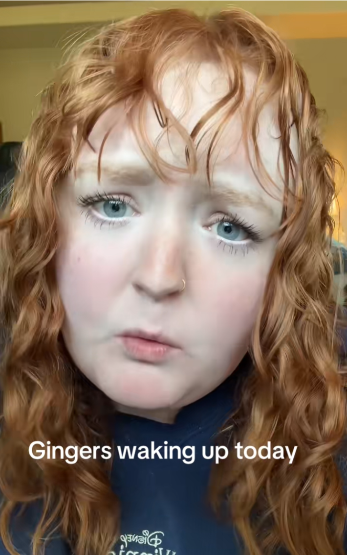 Confused-looking redheaded woman looking at the camera. Text reads, "Gingers waking up today."