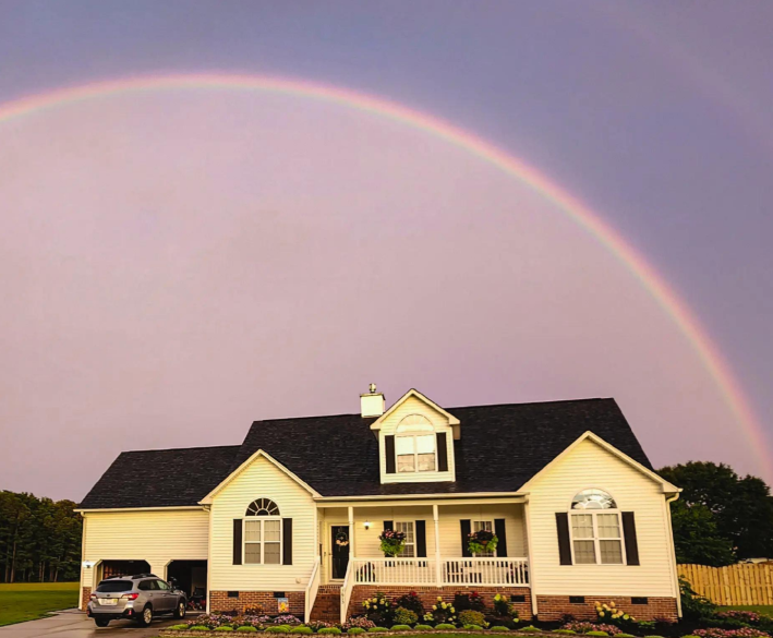 rainbow over a house