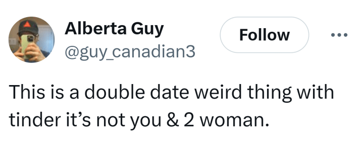 Tweet that reads, "This is a double date weird thing with tinder it’s not you & 2 woman."