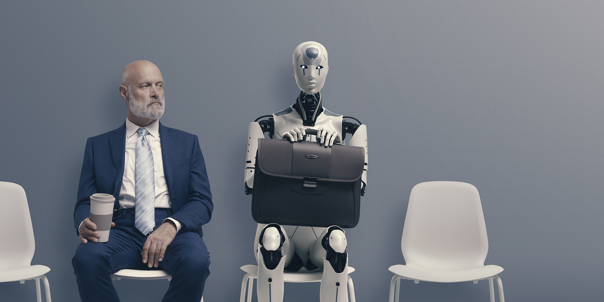 Man in suit and AI robot wait in office to be interviewed for job.