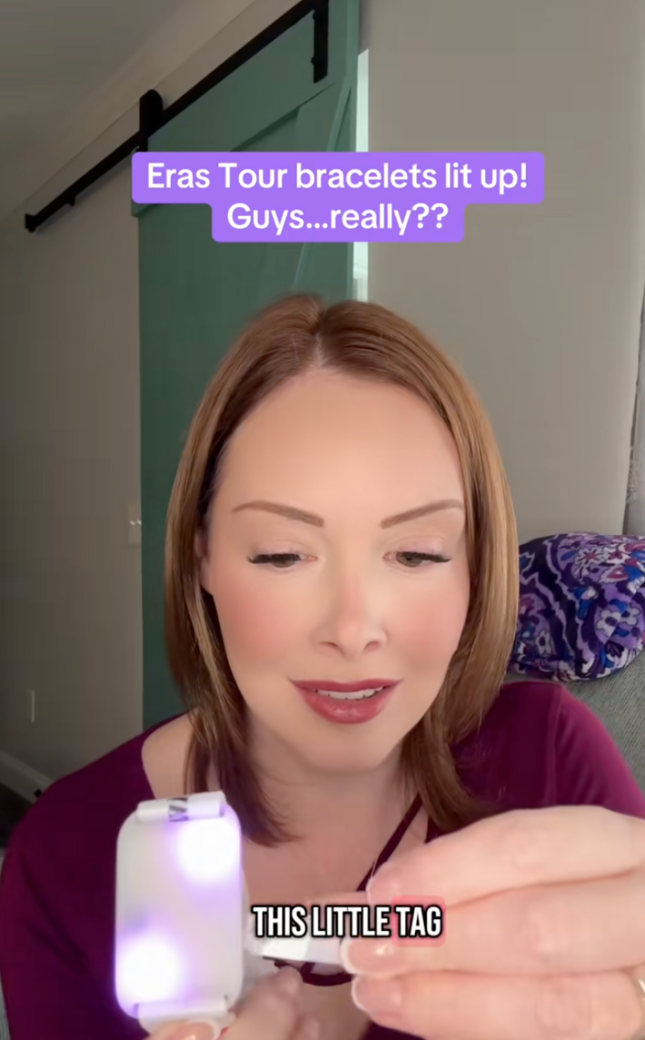 TikToker showing how to save the battery on her Eras Tour bracelet.