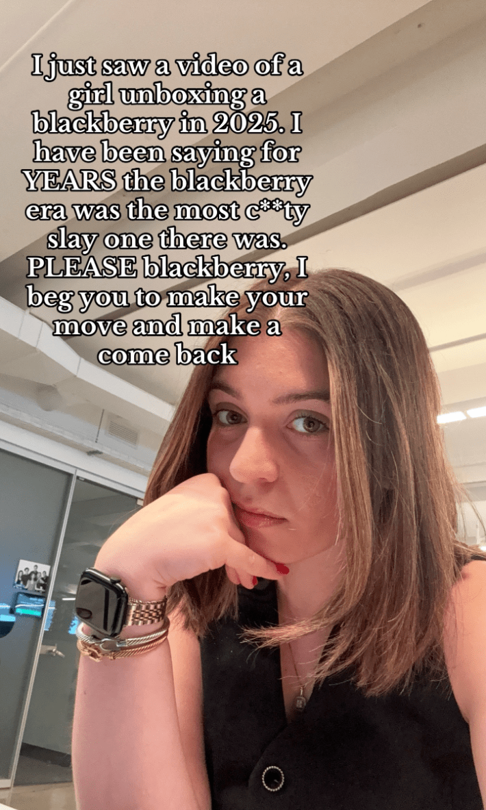 TikTok screenshot of a woman staring at the camera. Text overlay reads, "I just saw a video fo a girl unboxing a blackberry in 2025. I have been saying for YEARS the blackberry era was the most c**ty slay one there was. PLEASE blackberry, I beg you to make your move and make a come back."