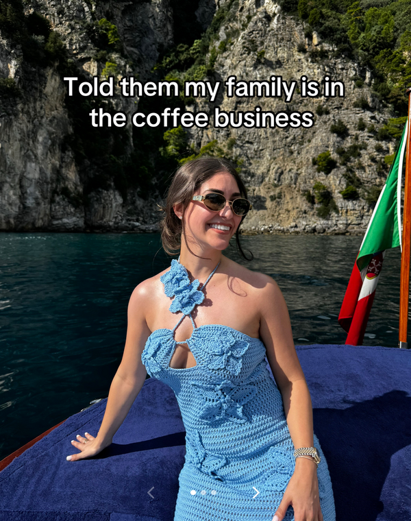 Nepo baby holy airball TikTok video with a woman posing in front of a body of water in a knit dress.