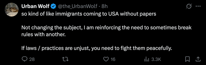 @the_UrbanWolf likened the situation to “immigrants coming to USA without papers,” and went on to say, “I am reinforcing the need to sometimes break rules with another. If laws/ practices are unjust, you need to fight them peacefully.”