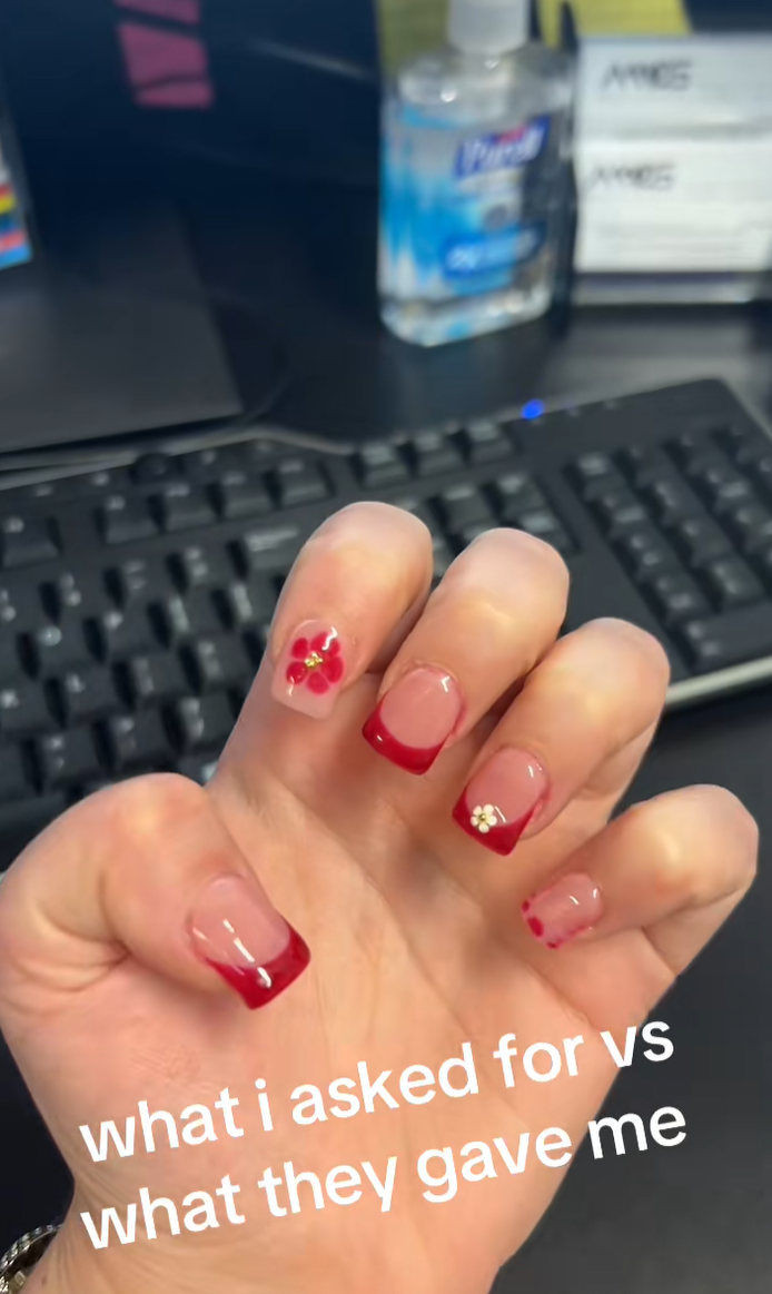 Jersey Shore nails with floral and red french tips.