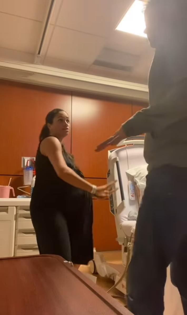 Meghan Markle and Prince Harry dancing while she was trying to induce labor.