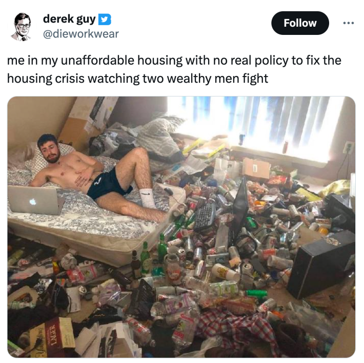 Tweet that reads, "me in my unaffordable housing with no real policy to fix the housing crisis watching two wealthy men fight" with a photo of a man lounging on a raw mattress with trash filling the floor.