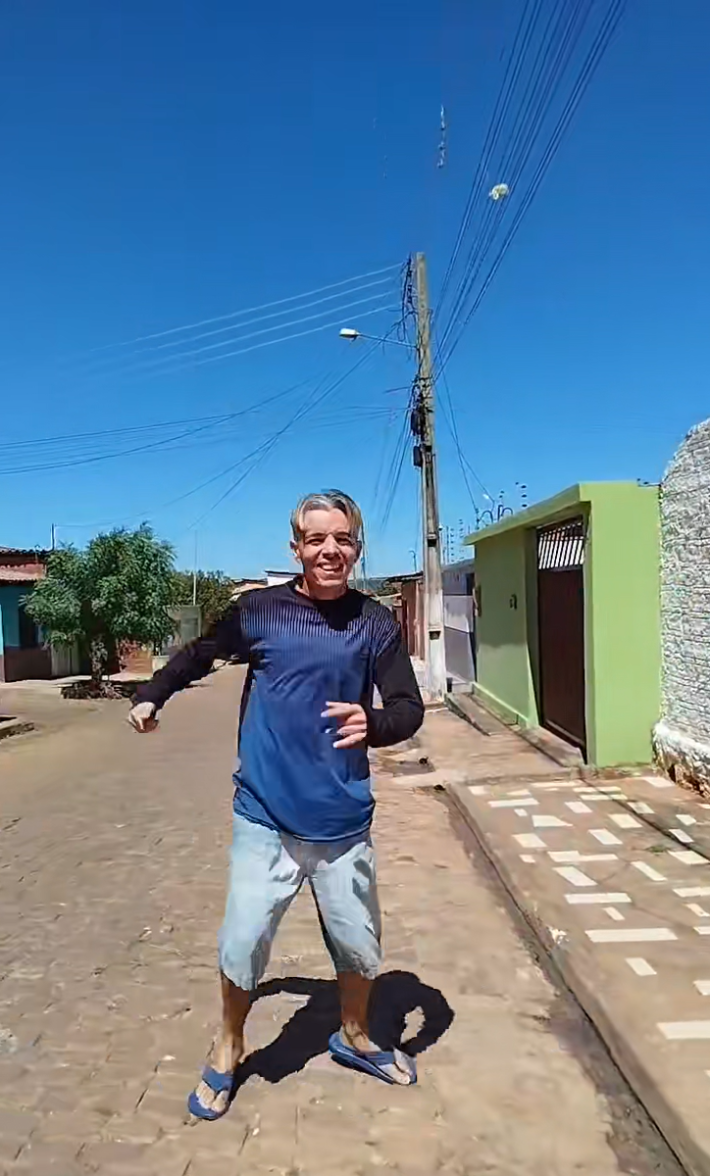 Man who claims to be "36 but looks 17" jumping around outside in jean shorts.