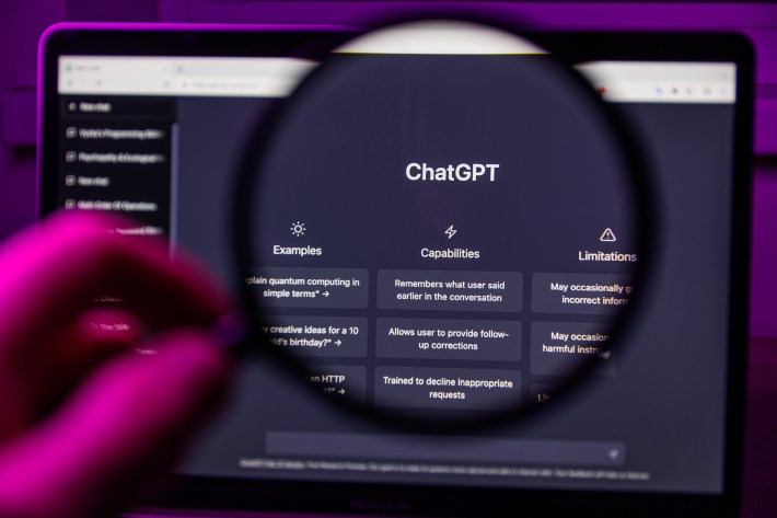 Chat GPT OpenAI through magnifying glass on screen