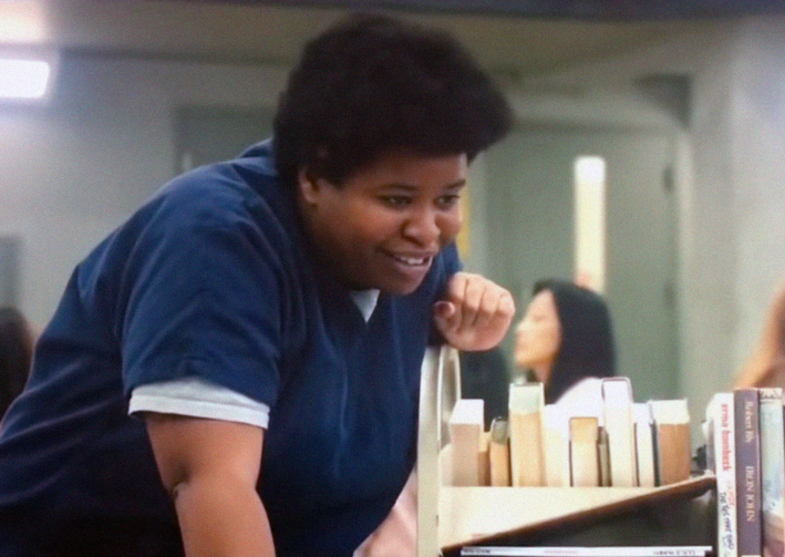 Mandela Bellamy as Rosalie Deitland in Orange Is The New Black acting opposite Uzo Aduba