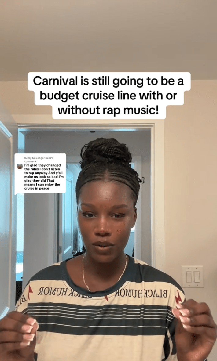 A Black woman explaining the current situation with Carnival's alleged ban on rap music.