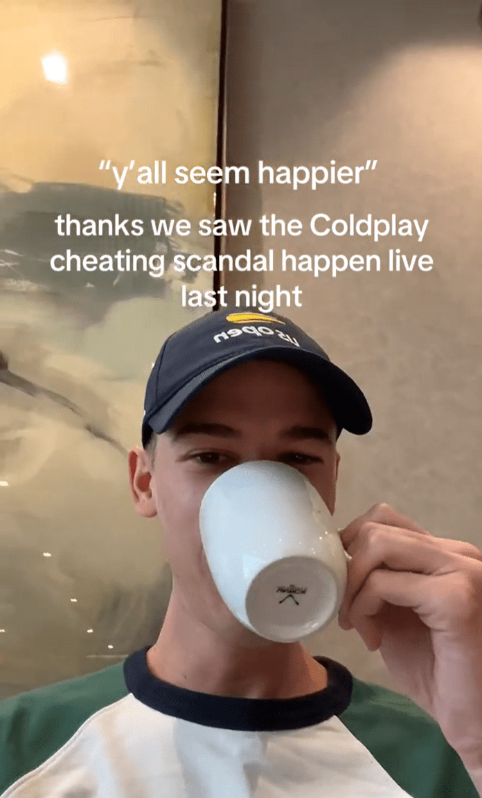A man in a hat drinking coffee. Text overlay reads, "y'all seem happier' thanks we saw the Coldplay cheating scandal happen live last night."